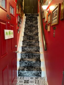 black stair runner install in entryway | Havertown Carpet