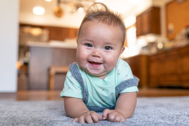 Baby lying on carpet flooring | Havertown Carpet